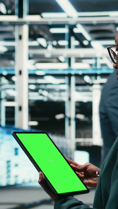 Vertical video Isolated screen mockup tablet used by data center software Stock Footage 329590531