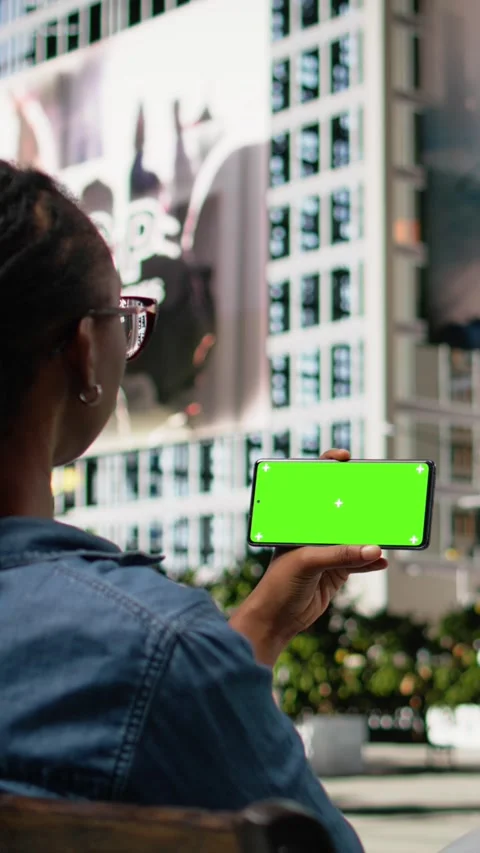 Vertical Video Isolated screen smartphone in landscape mode used by relaxed Stock Footage 334200269