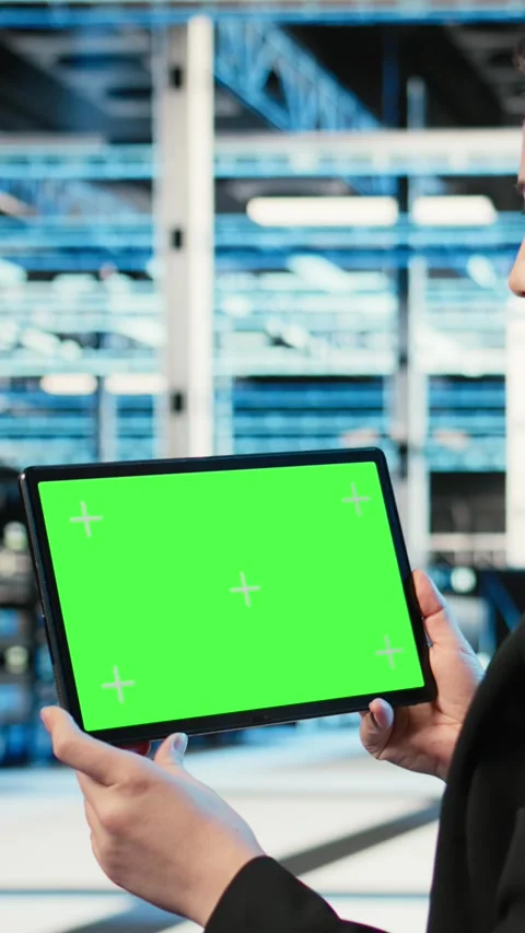 Vertical video Isolated screen tablet in data center used by software developer Stock Footage 329316450