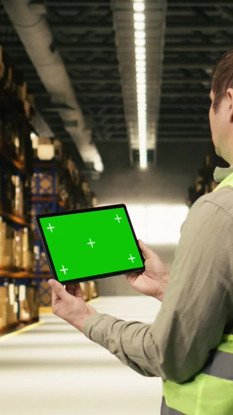Vertical Video Isolated screen on tablet with warehouse staff member near cargo Stock Footage 333090084