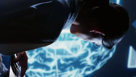 Vertical video IT admin writing AI script Stock Footage 249843995