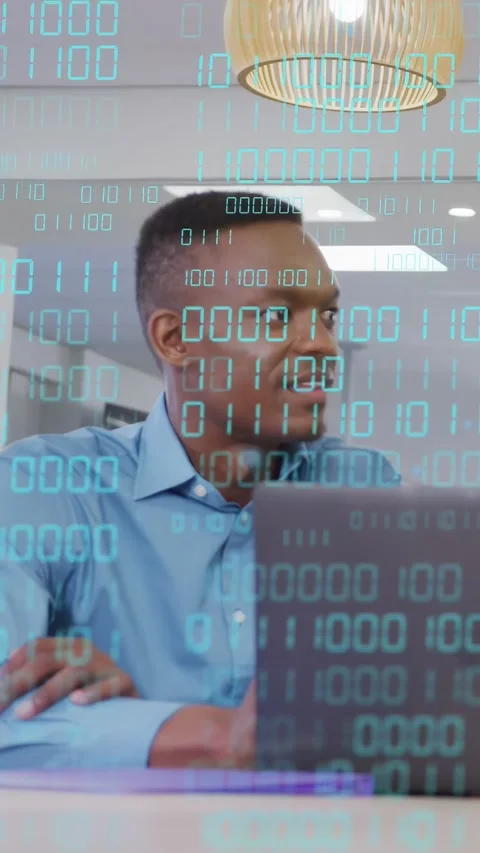 Vertical video: IT analyst hearing call, turning right, replying while binary Stock Footage 333513339