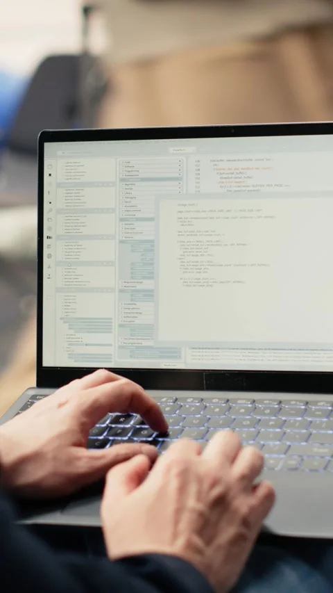 Vertical Video IT engineer creating scripts and managing databases for web Stock Footage 333612414