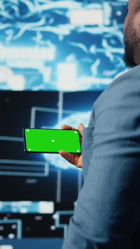 Vertical Video IT engineer in a high tech space uses copy space display with AI Stock Footage 312122846