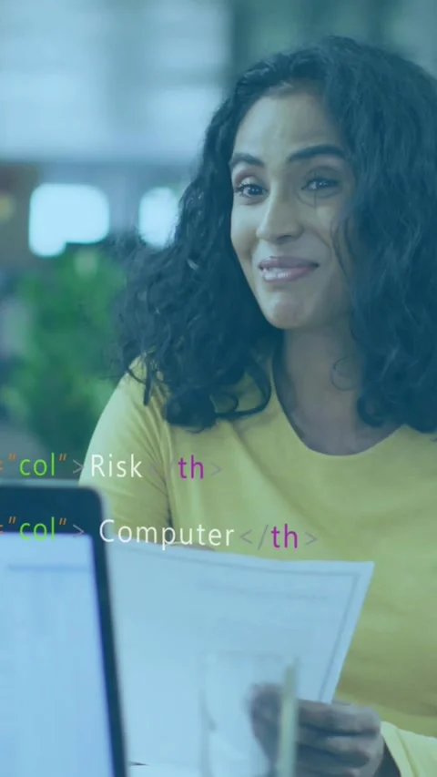 Vertical video: IT pro reviewing doc, peer hand reaching laptop, code overlay Stock Footage 331167068