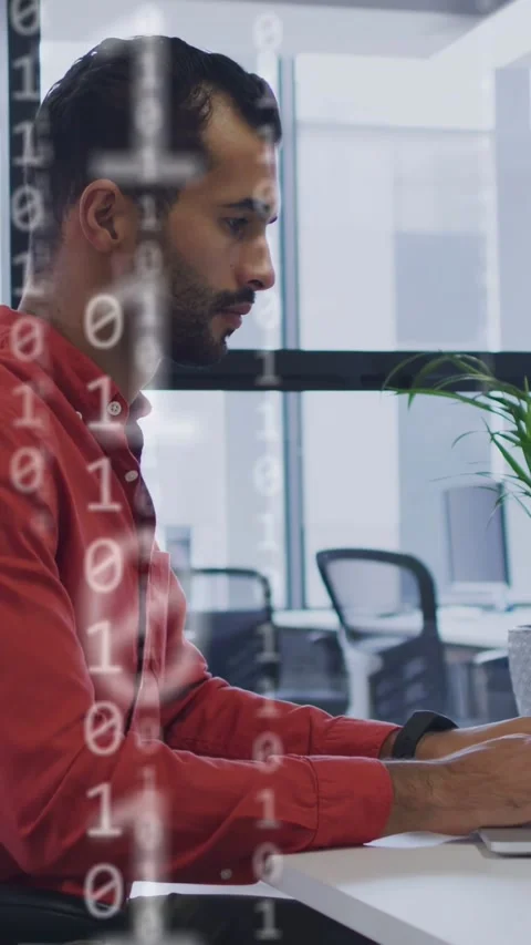 Vertical video: IT pro typing laptop triggers binary and cyan nodes, taking Stock Footage 335802676
