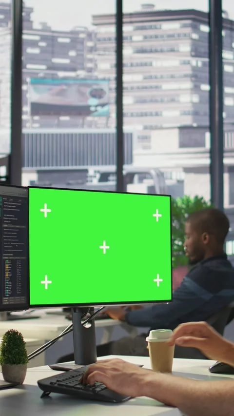 Vertical video IT specialist programming using chroma key computer Stock Footage 319480097