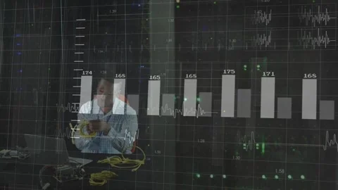 Vertical video: IT tech tapping tester, handling yellow cables by racks, Stock Footage 332685840