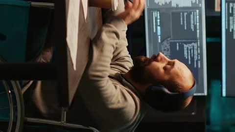 Vertical video: IT web developer writing source code in office Stock Footage 221656411