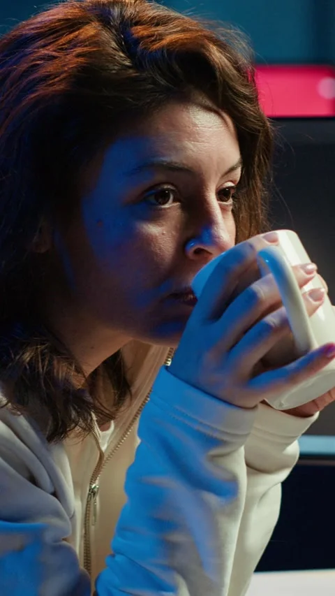 Vertical video Joyful IT worker holding coffee mug and debugging code Stock Footage 283508300