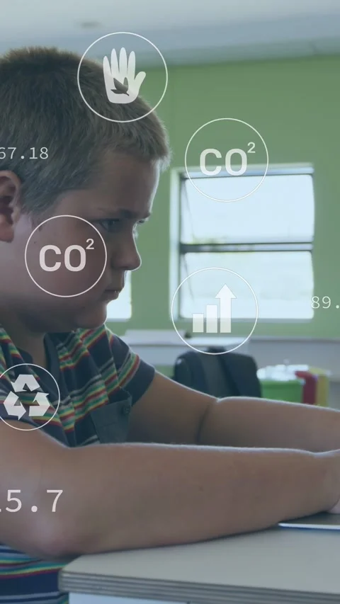 Vertical video: Kid sitting at desk tablet starting feed HUD icons moving Stock Footage 332735150