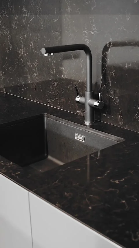 Vertical video. Kitchen sink and faucet in black and marble. modern kitchen Stock Footage 323451194