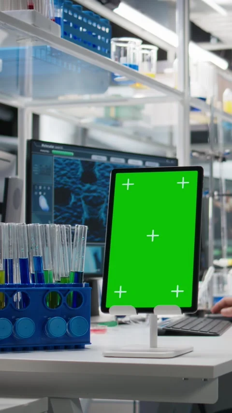 Vertical video Lab engineer using isolated screen tablet for DNA data analysis Stock Footage 319505162