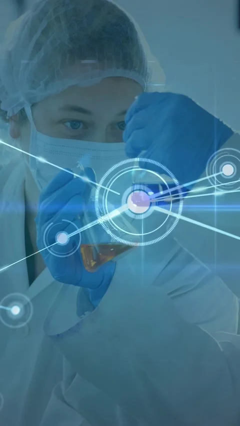 Vertical video: Lab tech bringing pipette into view, dosing amber liquid into Stock Footage 331291912