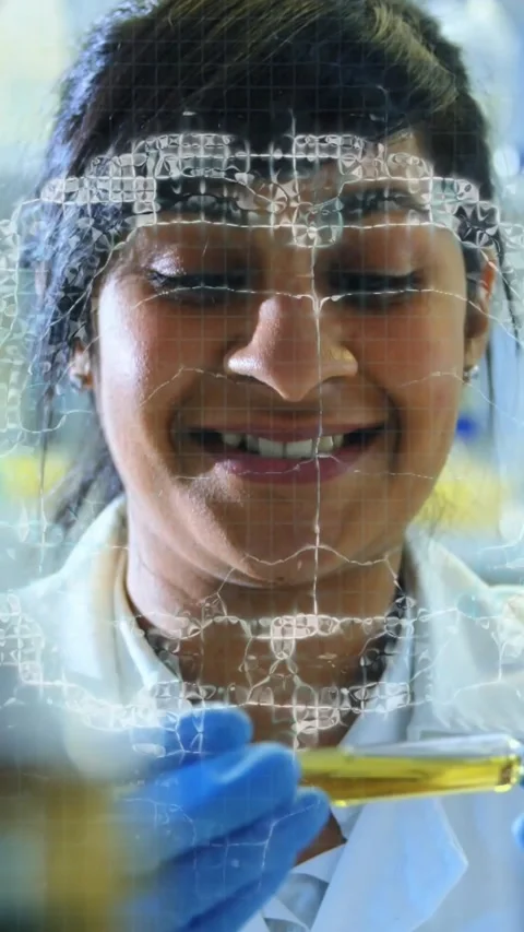Vertical video: Lab tech lifting test tube and checking yellow sample, cracked Stock Footage 330769832