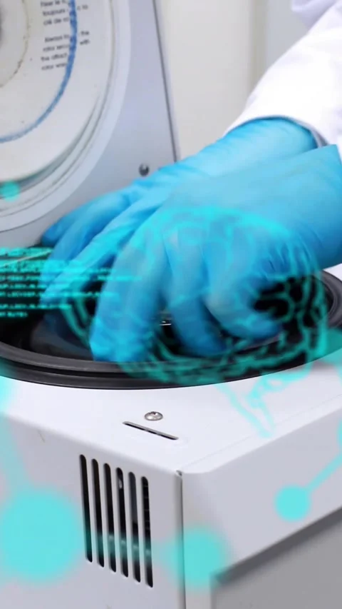 Vertical video: Lab tech opening centrifuge lid, loading rotor, blue holo code Stock Footage 330260497