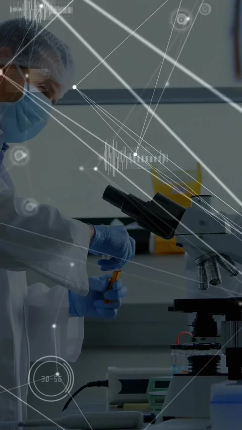 Vertical video: Lab tech pipetting into vial placing sample focusing microscope Stock Footage 331291931