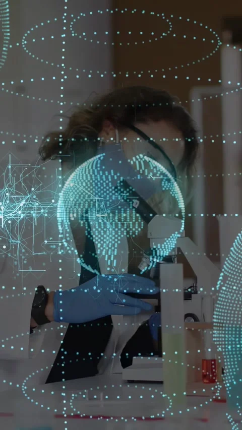 Vertical video: Lab tech placing slide and testing sample for research while Stock Footage 330306208