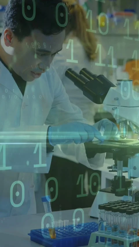 Vertical video: Lab tech placing slide focusing and analyzing sample binary Stock Footage 335264110