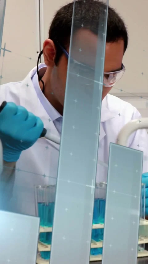 Vertical video: Lab tech reaching pipette, pipetting blue tubes for testing Stock Footage 331128321