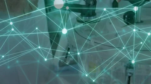 Vertical video: Lab tech reaching adjusting lever knob securing beaker while Stockbeeldmateriaal 332614029