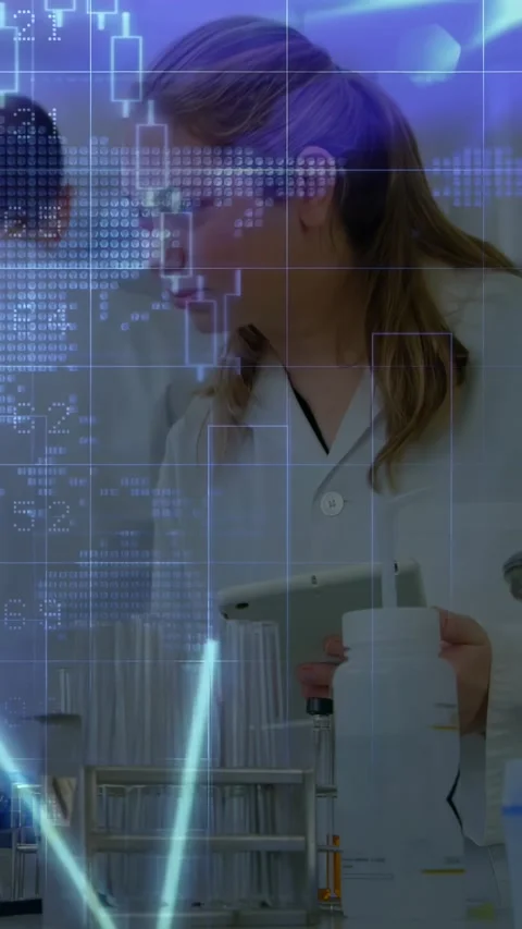 Vertical video: Lab tech scanning tubes with tablet and vial as new blue graphs Stock Footage 331337011