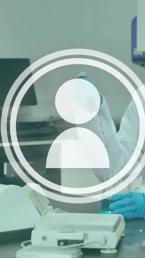 Vertical video: Labtech reaching pipette, pipetting blue into vial for 動画素材 331009396