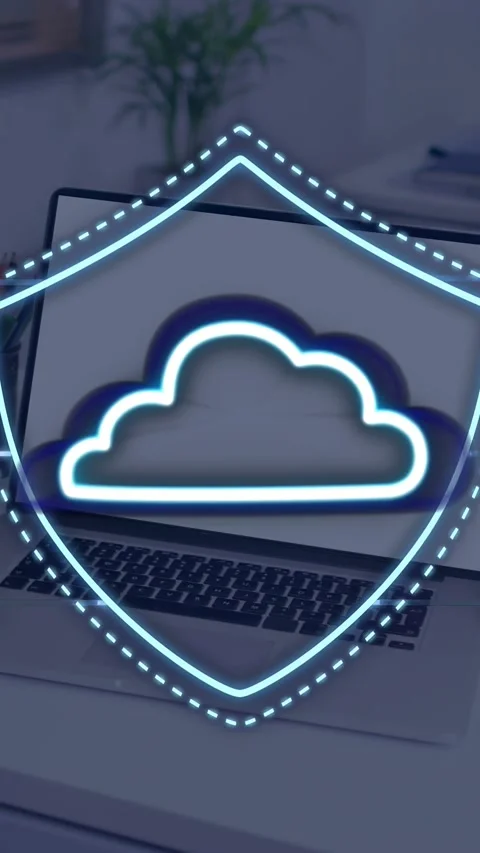 Vertical video: Laptop showing blue particles growing, forming shield and cloud, Stock Footage 335741009