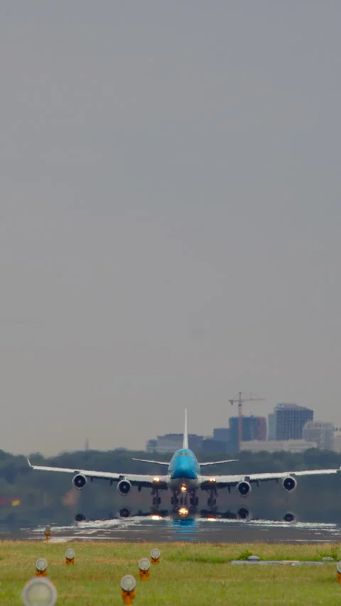 Vertical video of large airplane taking off from runway Stock Footage 300637600