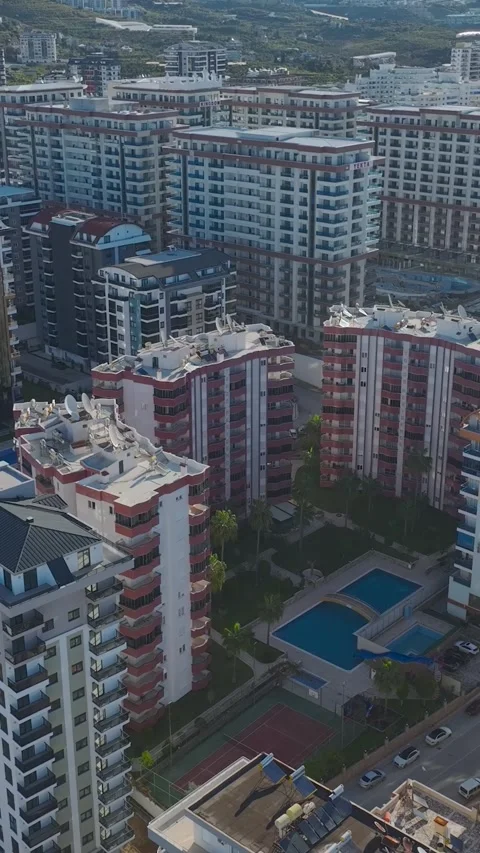 Vertical Video Large Construction Project with Multi Floor Concrete Building Stock Footage 342455159