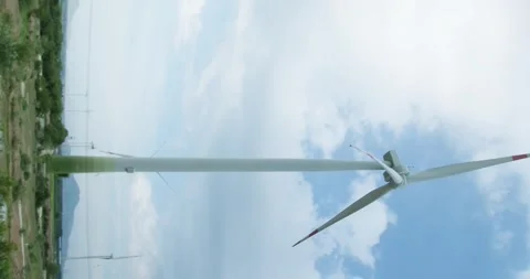 Vertical video. Large rotor wind electric generator. Modern renewable fuel Stock Footage 286249802