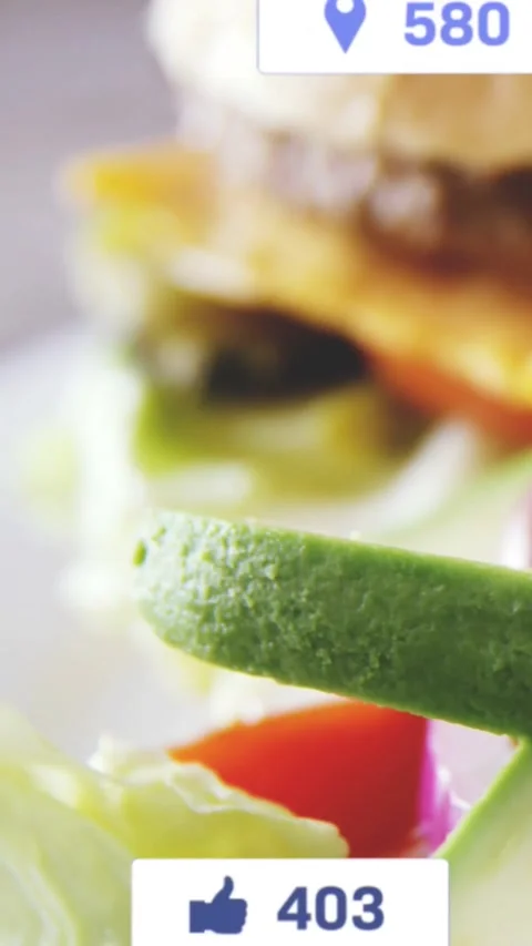 Vertical video: Layered sandwich getting UI badges on cursor hover, displaying Stock Footage 328398686