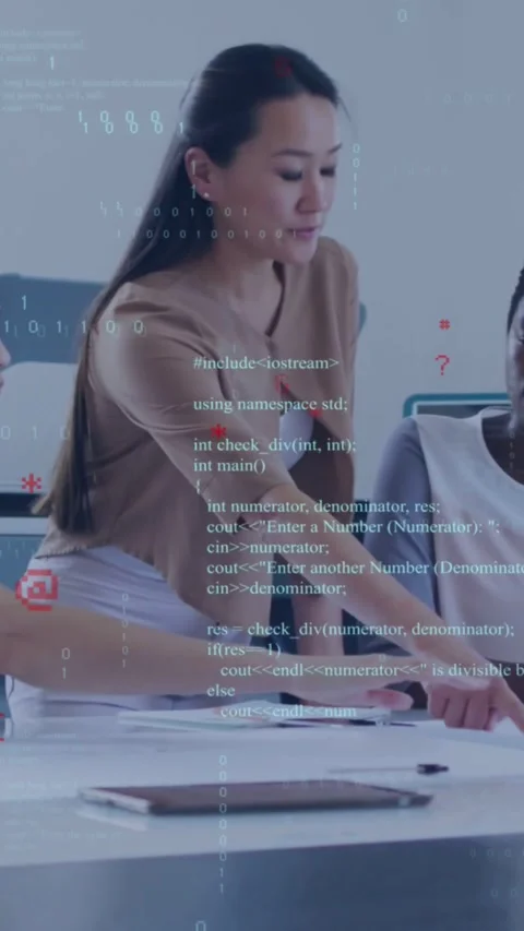 Vertical video: Lead leaning over table, pointing to docs, tablet, code overlay Stock Footage 334541201