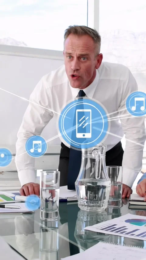 Vertical video: Lead leaning over table, camera pulling back, opening mobile Stock Footage 334599210
