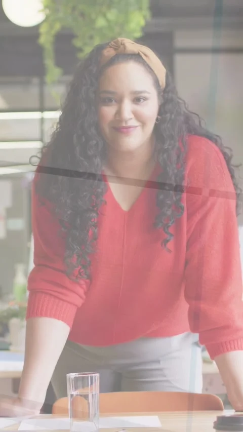 Vertical video: Lead leaning on table holding gaze while camera zooming, Stock Footage 333821686
