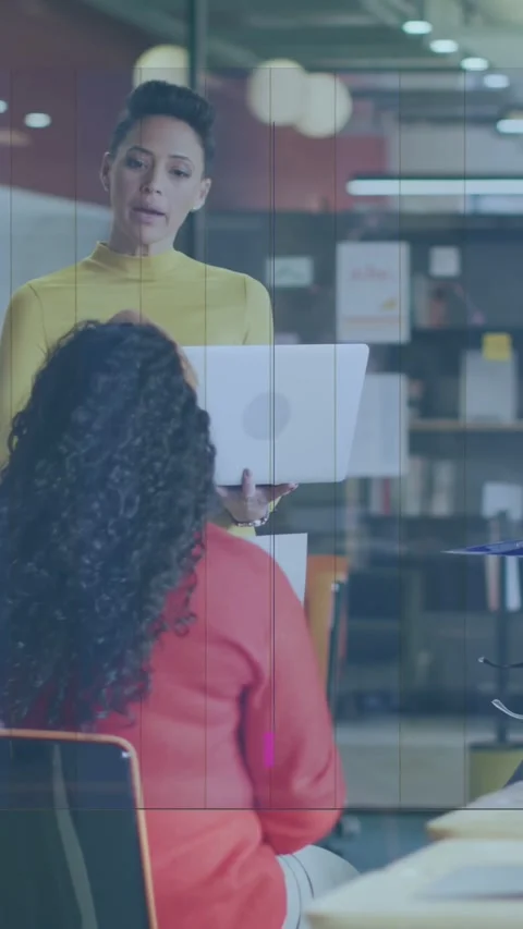 Vertical video: Lead opening laptop sharing work data, moving bars showing key Stock Footage 333721075