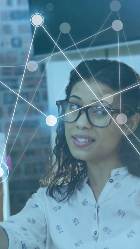 Vertical video: Lead pointing at screen causing node layer fading over face Stock Footage 333556131