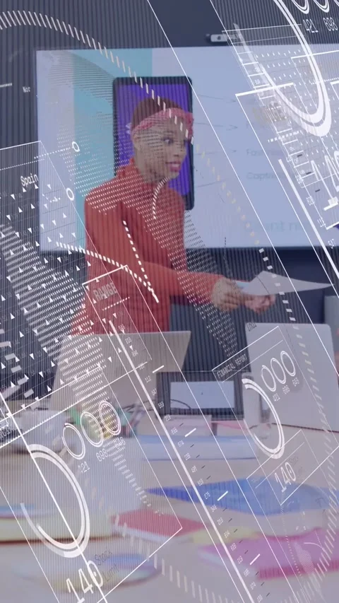 Vertical video: Lead starting tech demo placing docs tapping laptop showing Stock Footage 332734769