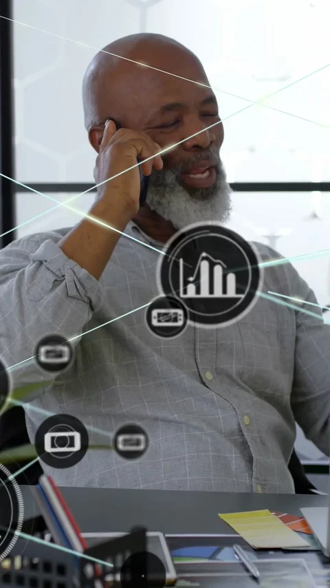 Vertical video: Lead taking call at desk, HUD over orchid expanding nodes around Stock Footage 333157476