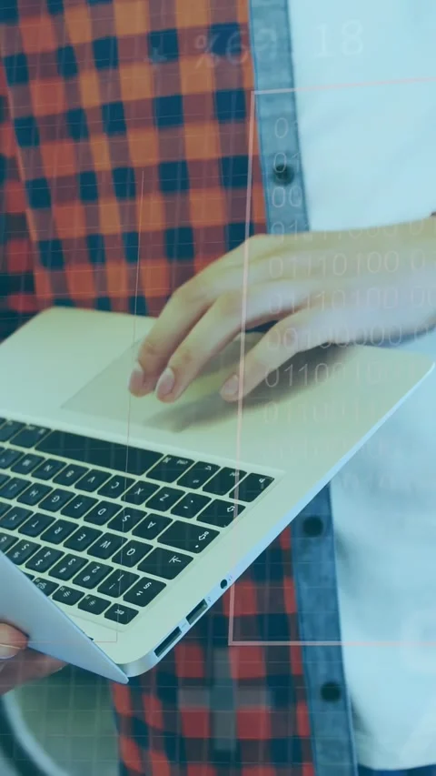 Vertical video: Lead using laptop pad reading sheet, peer moving tablet, data Stock Footage 335355314