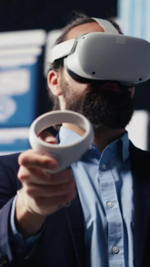 Vertical Video Leader does data driven planning with VR device set for Stock Footage 310703081