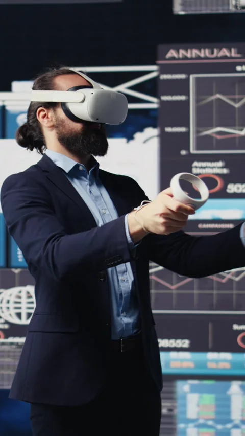 Vertical Video Leader does data driven planning with VR device set for Stock Footage 310704237