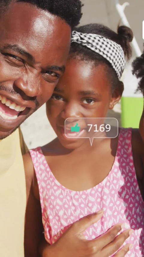 Vertical video: Leaning man posing with girl in pink dress for phone selfie at Stock Footage 332335686