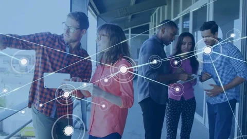 Vertical video: Left man pointing, team checking devices, data web linking Stock Footage 334040784
