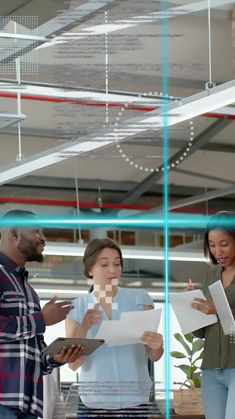 Vertical video: Left man tapping tablet sparking HUD while team checking docs Stock Footage 337543424