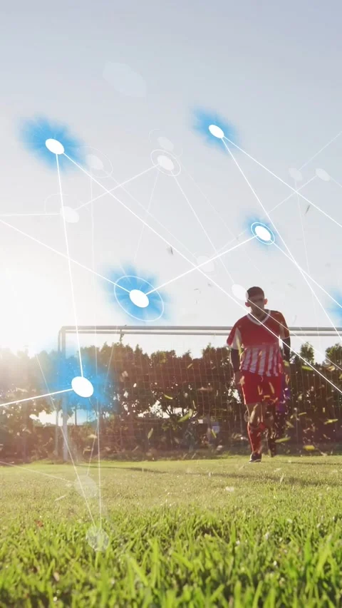 Vertical video: Left player entering team running to ball sparking node grid Video stock 333304762
