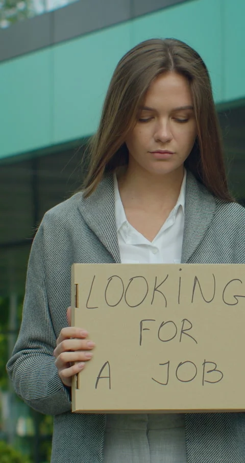 Vertical video. Left to right pan real time portrait shot of businesswoman Stock Footage 345587131