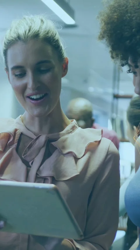Vertical video: Left woman tapping tablet to demo commerce on train, cart and Stock Footage 333157433