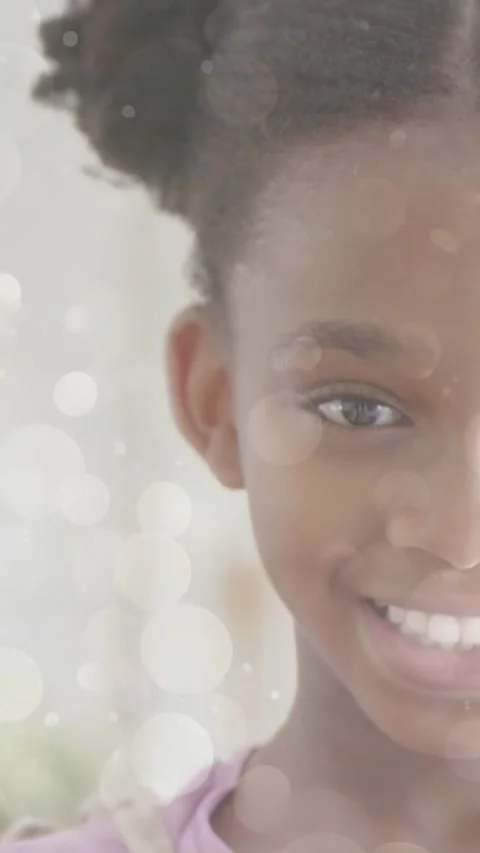 Vertical video: Lens moving back causing girl holding gaze smiling wider under Video stock 334377376