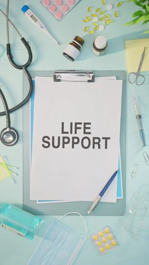 VERTICAL VIDEO OF LIFE SUPPORT WRITTEN ON MEDICAL PAPER Stock Footage 308109044